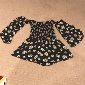 Floral romper tight at the top with loose sleeves